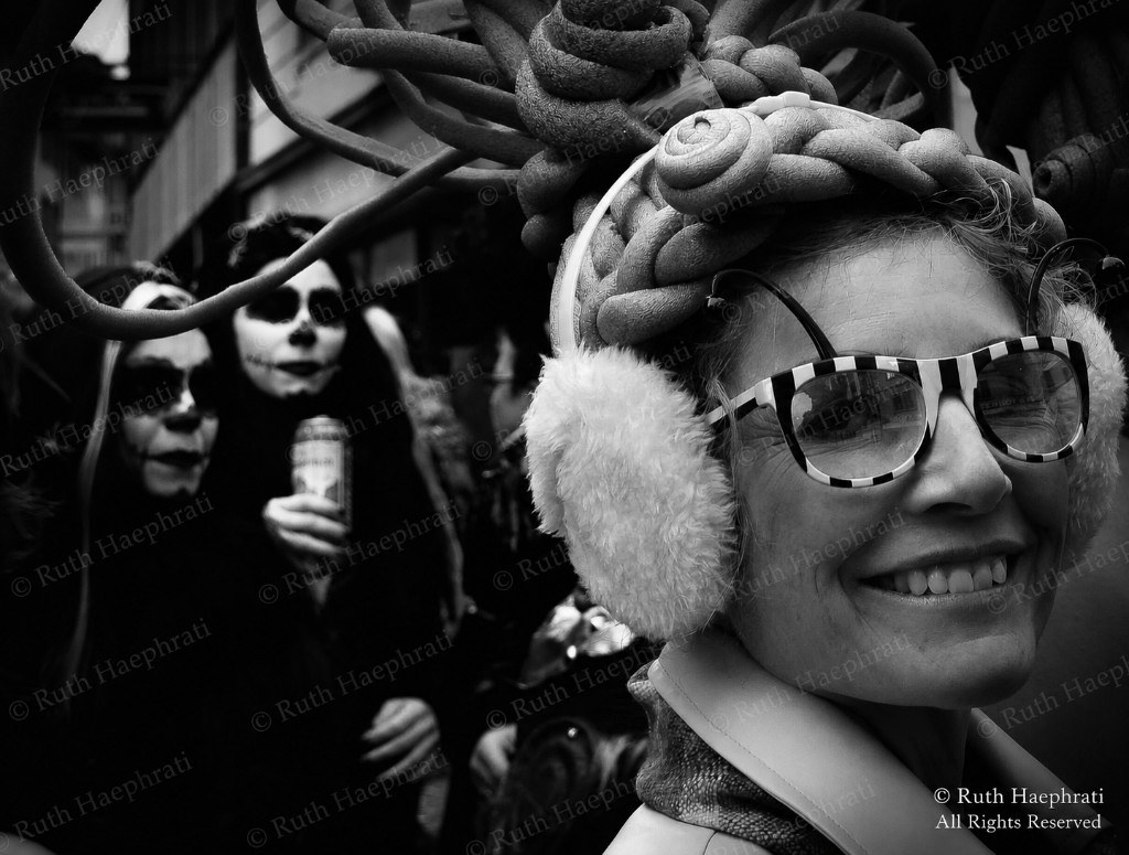 Smiling woman in costume at a street festival